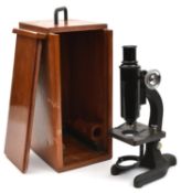 A Monocular microscope by Hall Bros. Croydon. An optical reflective microscope with a 10x eye