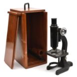 A Monocular microscope by Hall Bros. Croydon. An optical reflective microscope with a 10x eye