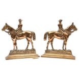 A pair of cast brass book ends, in the form of mounted Boer War period figures in slouch hats,