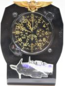 Elgin 37500 cockpit clock. Bakelite and aluminium housing, mounted in plastic stand with USN wings