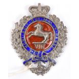 A Vic officer's blue and red enamelled silver badge of The King's (Liverpool Regiment), White