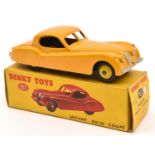 A Dinky Toys Jaguar XK120 Coupe (157). In yellow with light yellow wheels and black rubber tyres.