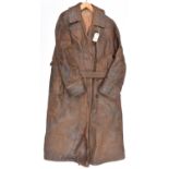 A WWI or later cloth lined brown leather double breasted trench or flying coat, with maker's label