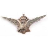 A cast silver badge in the form of WWII Bulgarian pilot's wings, the back stamped “800” and with pin