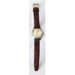 KM marked Selza wristwatch. Serial 500905. Plated case, brushed finish on sides, slight plating