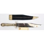 A Victorian Bowie knife, the bright polished blade 8” etched on one side with foliate scrolls and “