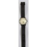 KM marked Berg wristwatch. Serial 683907. Plated case, brushed finish, some wear and marks to
