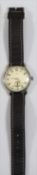 KM marked Berg wristwatch. Serial 683907. Plated case, brushed finish, some wear and marks to