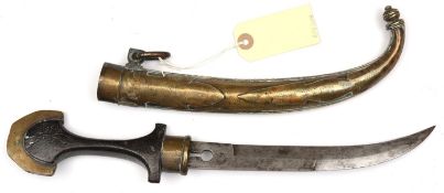 A Moroccan jambiya, blade 8½” pierced with dumb bell shape at the forte, the hilt of dark wood