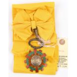 Ecuador: Order of National Merit, sash and sash badge in silver gilt with 12 red enamelled rays