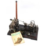 A Doll & Co. live steam tinplate horizontal electricity generating steam plant. A boiler with