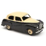 Dinky Toys Austin Somerset (161). An example in black and cream with cream wheels and black tyres.