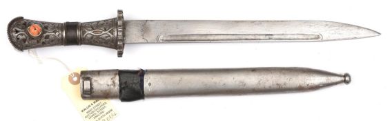 A Tibetan dagger. Probably 20th century, straight SE blade 29cms cut with a single fuller, small