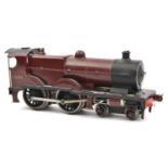 A Bassett Lowke 3-rail 4-4-0 tender locomotive for restoration. All parts over-painted in maroon