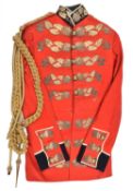 A Geo V scarlet tunic of an ADC to the Viceroy of India, blue facings, white edging to collar, cuffs