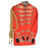 A Geo V scarlet tunic of an ADC to the Viceroy of India, blue facings, white edging to collar, cuffs