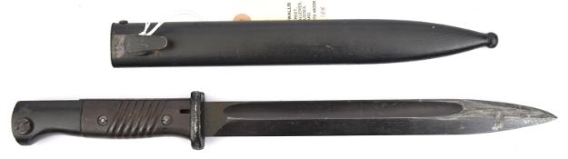A Third Reich K98 bayonet, with maker's code “41 dd”, with brown bakelite grips, in its non matching