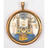Masonic Interest: a small circular masonic pendant, diam 41mm, depicting the all seeing eye, temple,