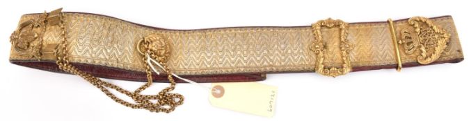 A Vic Hussar officer's gilt lace shoulder belt, lace (pattern 63/65) on maroon leather, gilt foliate