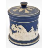 A Staffordshire jasperware pot by William Adams of Tunstall. A lidded pot in blue and white with