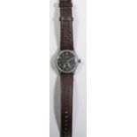 D marked Titus wristwatch. Serial D891542. Base metal case, no plating remaining, 32mm without