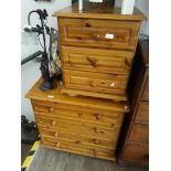 A pine chest of drawers and matching pine bedside