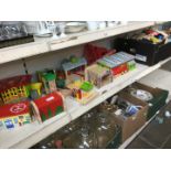 Box of wooden train toy set and numerous buildings
