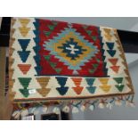 A Turkish kilim 120cm by 86cm