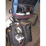 2 camera bags with cameras and accessories