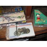 Quantity of 4 old games to include a tin drumming Panda with key, a Keil Kraft model kit, a Heller