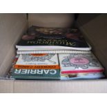 A box of misc cooking books