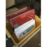 A box containing postcards