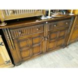 An Ercol priory style sideboard