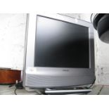 A 15" Sony LCD colour TV with remote and lead extension