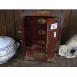 Small wood and brass oriental cabinet