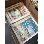 A box of vintage Lions & Tiger comics