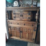 A priory syle reproduction oak court cupboard