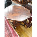 An edwardian octaganol inlaid table