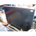 A 32" Onn TV with remote