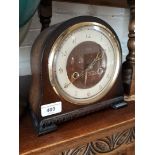 A Smiths Art Deco oak mantle clock.