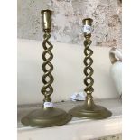 pair of brass open twist candlesticks