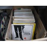 A box of LPs and singles.