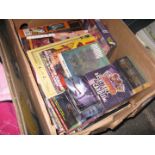 A box of various SciFi magazines and trading cards, etc