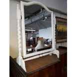A painted swing mirror