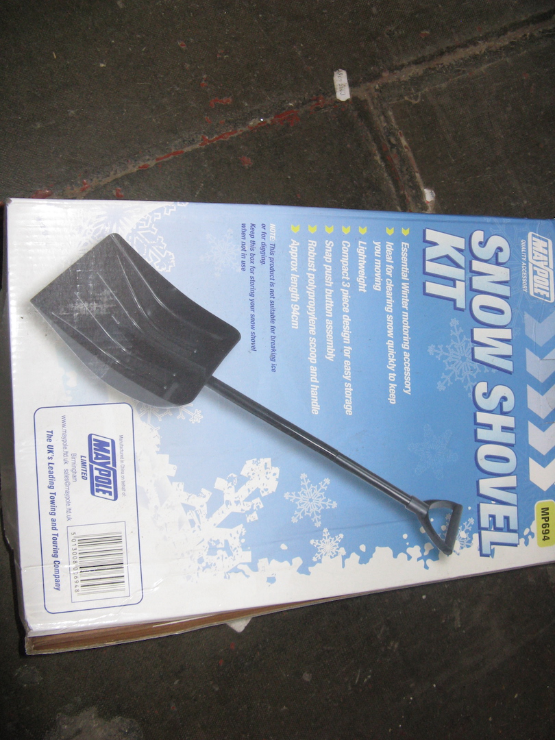 A boxed snow shovel kit
