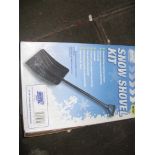 A boxed snow shovel kit