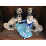 A pair of Staffordshire dogs and a Royal Doulton lady figure - Janette