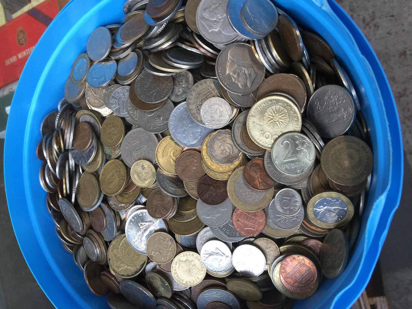 A tub of world coins