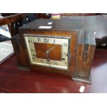 An art deco oak cased mantle clock