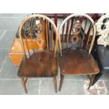 A pair of Ercol windsor chairs